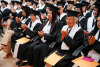 Awarding of degrees to UNIB scholarship recipients in Ecuador.